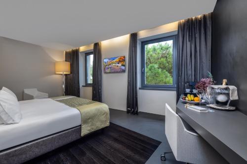 Lido Palace - The Leading Hotels of the Worldにあるベッド