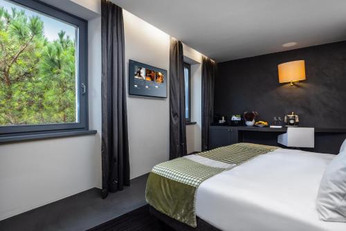 Lido Palace - The Leading Hotels of the Worldにあるベッド