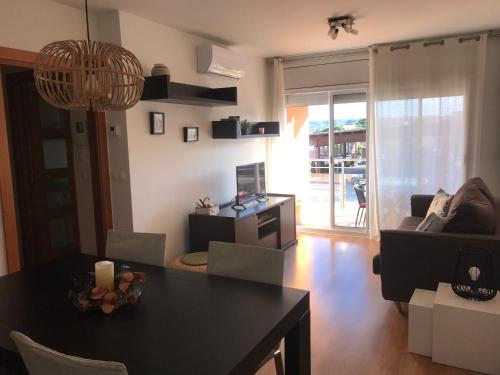 Posedenie v ubytovaní Apartament Catalunya, céntrico y con Parking
