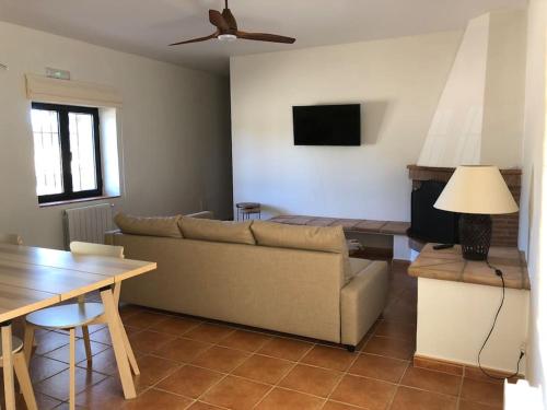 A seating area at Cortijo Los Lomillos - La Encina