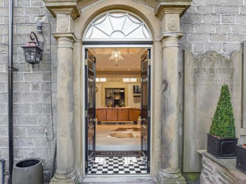 an entrance to a building with a glass door at Old Chapel House in Barnoldswick