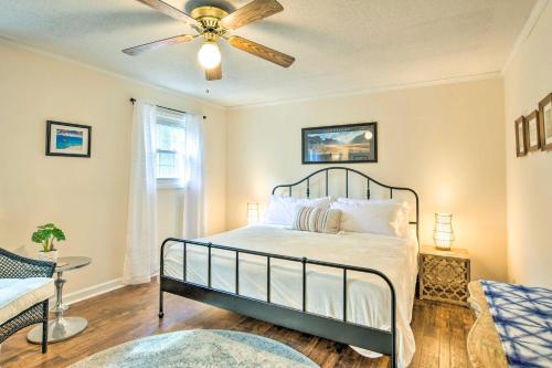 a bedroom with a bed with a ceiling fan at Lovely Taylors Home 8 Mi to Dtwn Greenville! in Greer