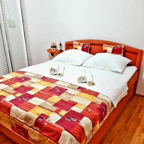 Llit o llits en una habitació de Apartman Park