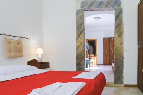 Postel nebo postele na pokoji v ubytování Ostello-Albergo dagli Elfi
