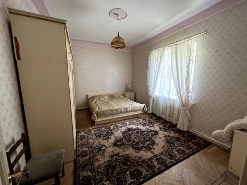 Postel nebo postele na pokoji v ubytování Частный дом в городе Севан