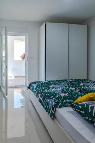 Ένα ή περισσότερα κρεβάτια σε δωμάτιο στο Comfortable apartment near Opatija