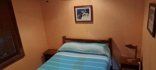 Ένα ή περισσότερα κρεβάτια σε δωμάτιο στο Nosara Paradise Rentals
