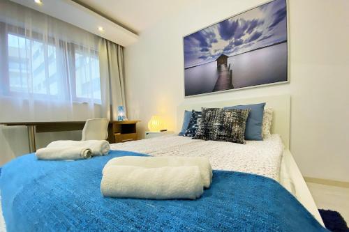 Posteľ alebo postele v izbe v ubytovaní erApartments Oxygen Residence