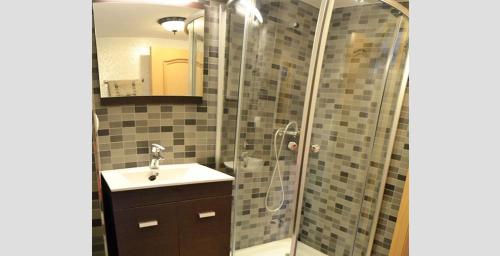 a bathroom with a shower and a sink at Casa Corralazos in Castril