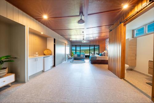Ένα ή περισσότερα κρεβάτια σε δωμάτιο στο Holiday Haven Whitsundays
