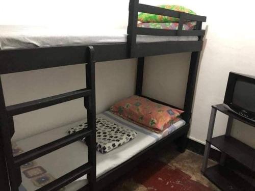 Cama o camas de una habitación en Yem Homestay