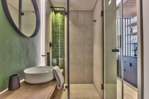 Et badeværelse på Luxury urban living at The Harri