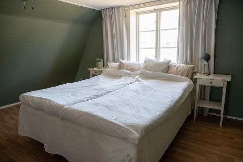Postel nebo postele na pokoji v ubytování Villa på landet, Habo