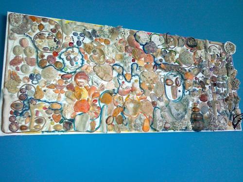 a painting of a group of people on a wall at The Colourful Mansion Hotel in Ahtopol