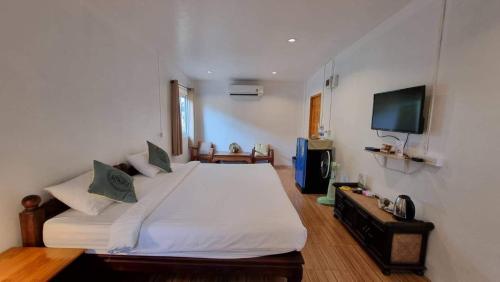 เตียงในห้องที่ โอลด์ทาวน์ บูติค เฮาส์ สุโขทัย