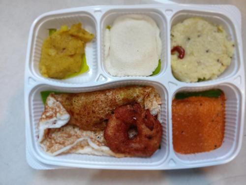 a styrofoam container filled with different types of food at Sri Aswin Grand in Nāmakkal