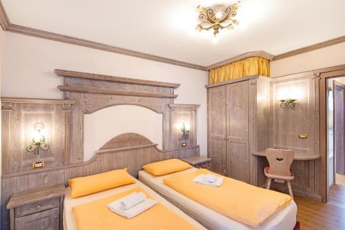 Postel nebo postele na pokoji v ubytování Casa Li Roina n 48