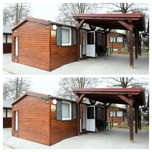 a wooden house with awning and a patio at F95 AQUALUNA KAMP NATURA PODČETRTEK swimming card not included in Podčetrtek