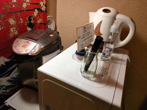 無料wi-fi JING HOUSE 秋葉原 電動自転車レンタルにあるコーヒーまたはお茶