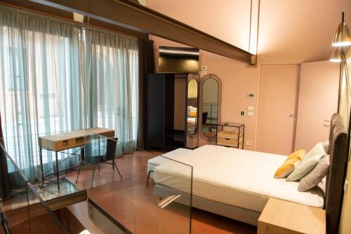 Posteľ alebo postele v izbe v ubytovaní Italianflat - Empireo Rooms - 200mt to Arena