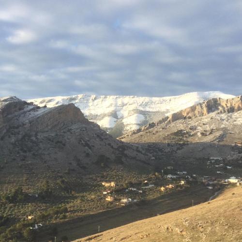 a view of a mountain range with snow covered mountains at Parador de Jaén in Jaén