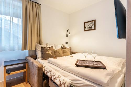 Ένα ή περισσότερα κρεβάτια σε δωμάτιο στο Apartment Saslonch Stlarida