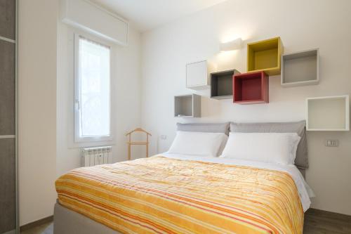 Letto o letti in una camera di Residence Cairoli 9 by Studio Vita