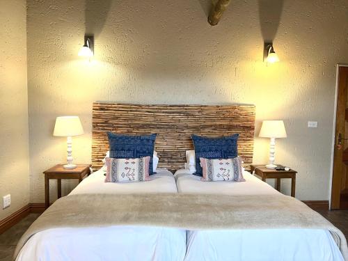 Katil atau katil-katil dalam bilik di Safari Club Guest Lodge OR Tambo International Airport