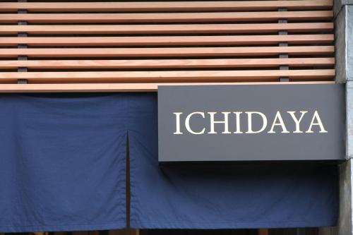a sign on the side of a building with the words icoglaya at Ichidaya in Toyooka