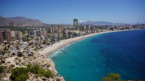 an aerial view of a beach and a city at Sunset Cliffs Luxury Apart with Sea View in Benidorm