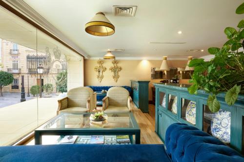Гостиная зона в Hotel Inglaterra