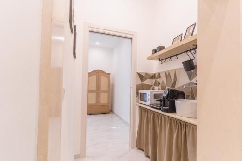 Kuchyň nebo kuchyňský kout v ubytování GUENDALINA SWEET HOME - LA CASETTA Di GUENDALINA