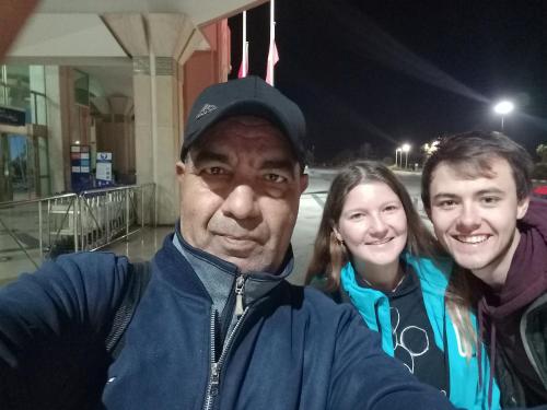 a man and two people posing for a picture at Airport Agadir Guest House in Agadir