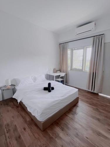 Ein Bett oder Betten in einem Zimmer der Unterkunft The Cozy Place Jonker Street by Nestcove