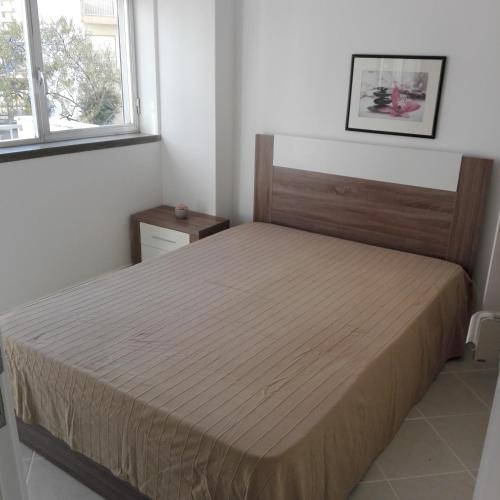 Кровать или кровати в номере Aquazul Beach Apartment