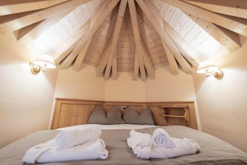 Postel nebo postele na pokoji v ubytování Albergo Conturina