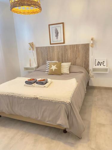 A bed or beds in a room at Espacio Edison 1