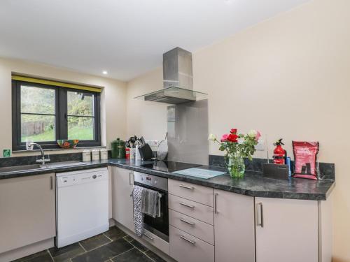a kitchen with a sink and a counter top at Nine Acres Barn in Marlborough
