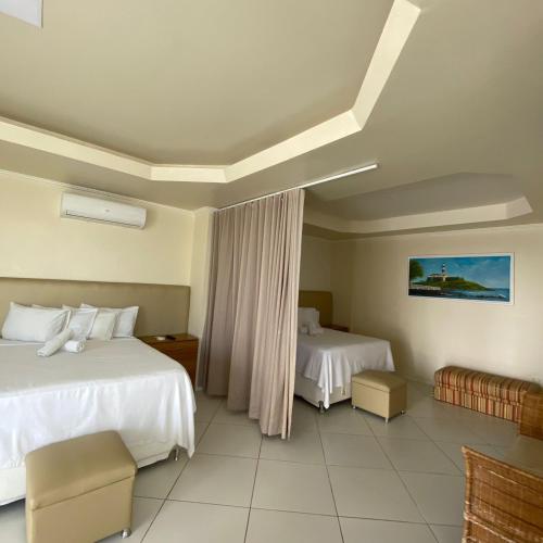 Postel nebo postele na pokoji v ubytování Hotel Monte Rei