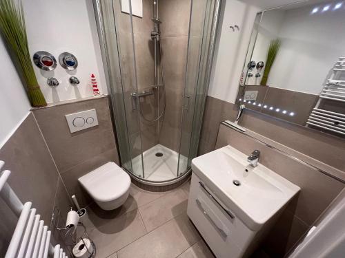 Et badeværelse på Residenz am Yachthafen, Whg 23