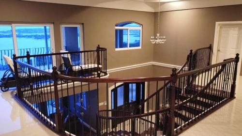 a spiral staircase in a home with a living room at BayWatch Villa - Montego Bay in Montego Bay