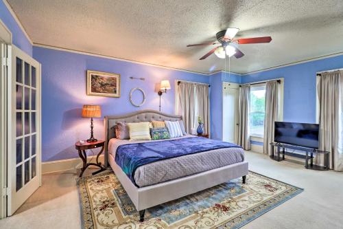 A bed or beds in a room at Historic 1927 Corsicana Getaway with Game Room!