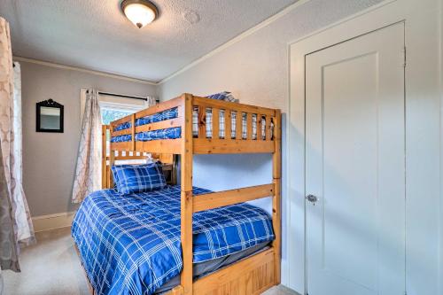 a bedroom with a bunk bed in a room at 1920s Corsicana Home - Spacious Group Getaway! in Corsicana