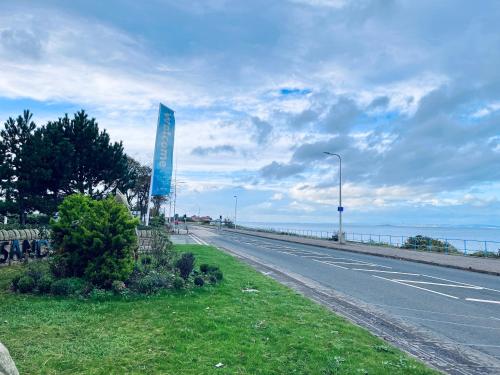 a road with a sign on the side of the road at Lovely 3 bedroom holiday home in Seton Sand caravan park Wi-Fi Xbox in Edinburgh