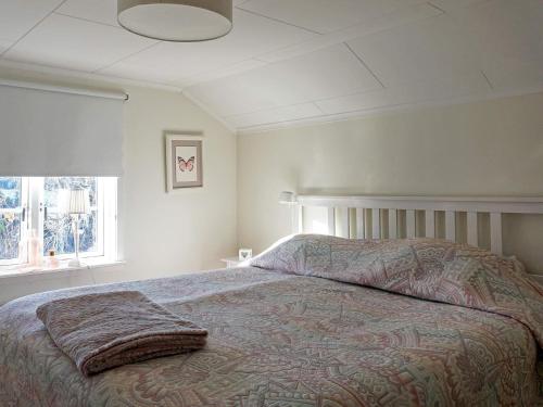 Postel nebo postele na pokoji v ubytování Holiday home Brastad XVII