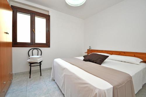 Ένα ή περισσότερα κρεβάτια σε δωμάτιο στο Residence Elena