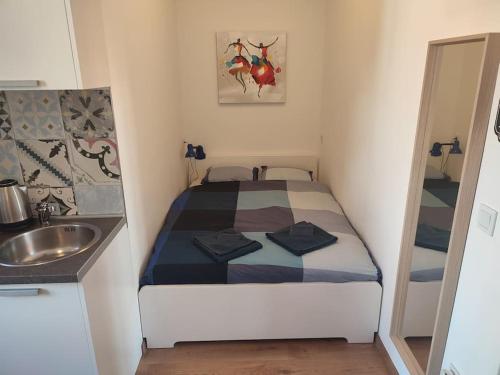 Posteľ alebo postele v izbe v ubytovaní Apartments City of Hearts 3