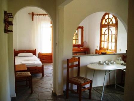 Ένα ή περισσότερα κρεβάτια σε δωμάτιο στο Pantheon Studios & Apartments