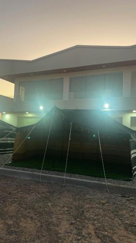 a building with a large ramp in front of it at Home X4 in Al Wāşil