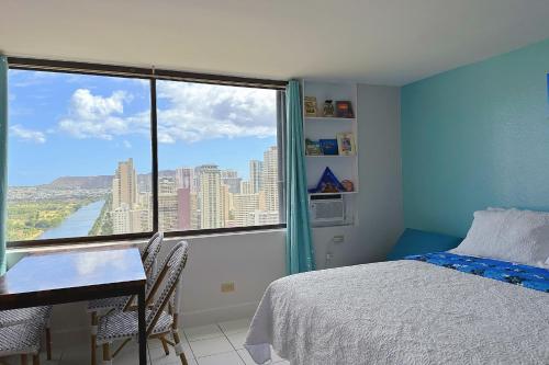 Katil atau katil-katil dalam bilik di Waikiki Condo High Floor Views Beaches Convention Center